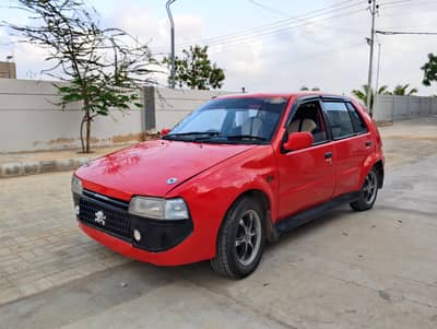 Daihatsu charade anda  1992 Indus carolla engine 1600cc