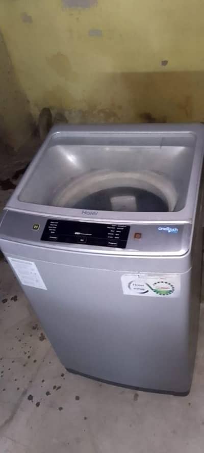 Haier washing machine fully automatic original condition me Hy 9 kg
