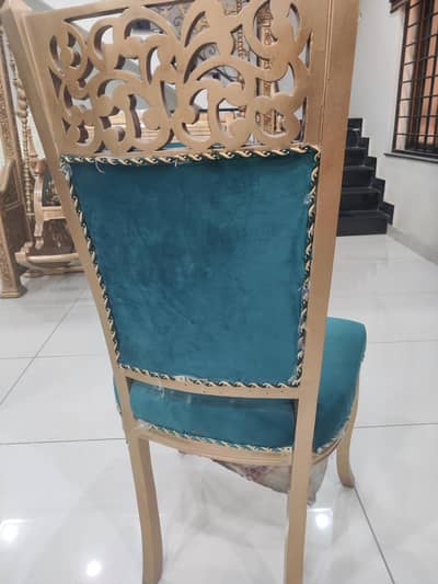 Glass table with Wooden chairs