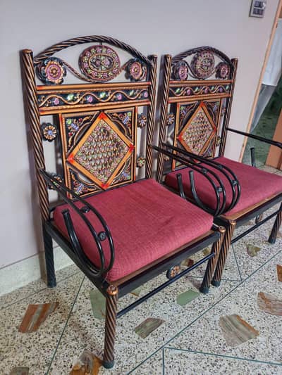 5 seater iron sofa with one table and tv trolly