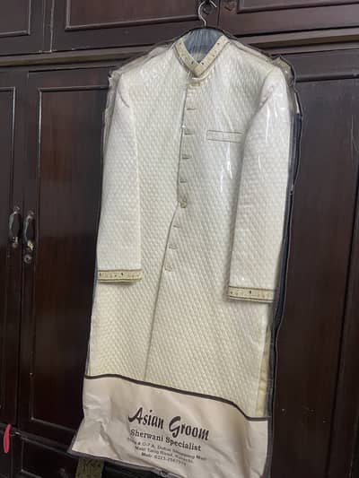 One time used sherwani by Asian groom Tariq road