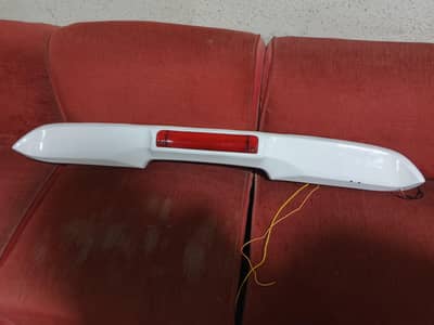 alto spoiler and back seat speaker