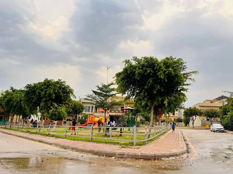 8Marla ideal location solid land plot with back open 12