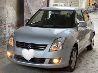 Suzuki Swift DLX 1.3 Total Genuine