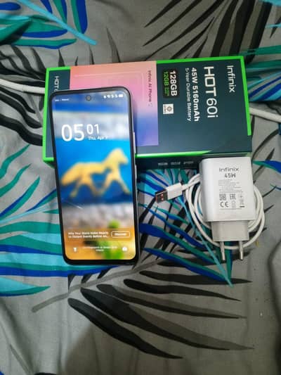 Infinix hot 60i 6 /128 charger and box available in warranty
