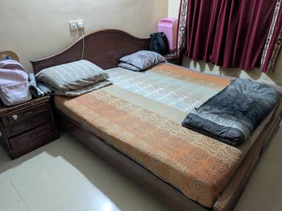 1 king bed 2 side tables and 3 door wardrobe