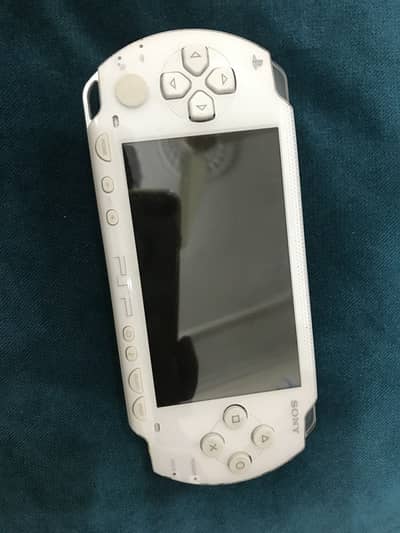 SONY PSP 1000 10/10 CONDITION WITH CHARGER AND 1GB MEMORY CARD