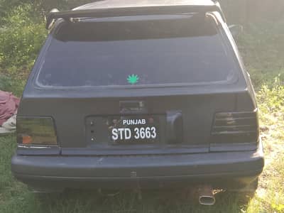 Suzuki Khyber 1988 model black wrapped cuttoff installed