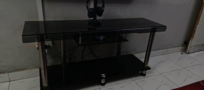 black glass table for TV at good condition