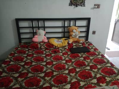 steel double bed and mattress
