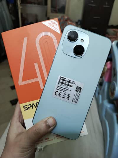 Tecno spark 40c new mobile box and charger just 2 month used