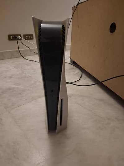 PS5 and one red controller