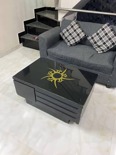 Centre wooden table with glass