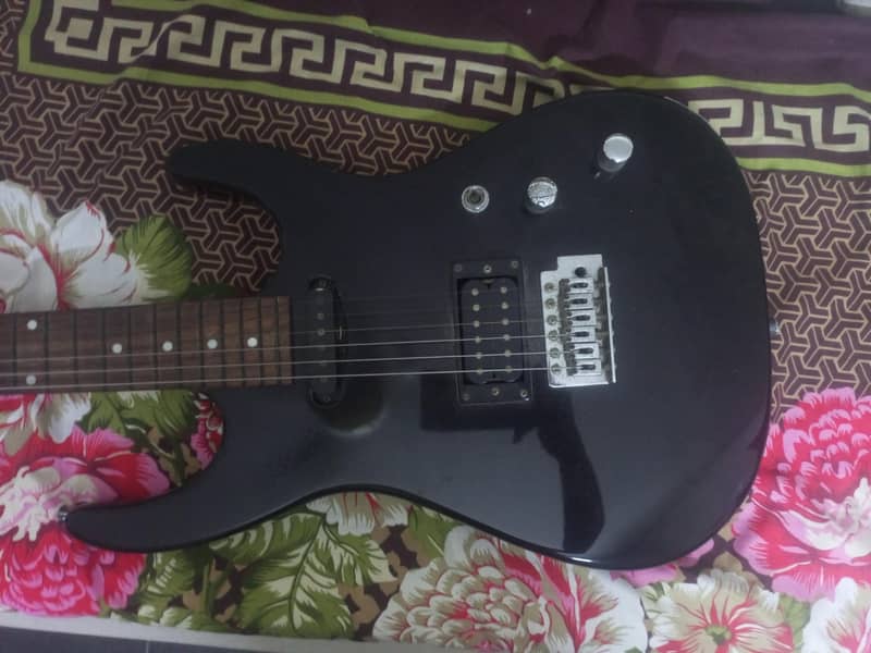 black electric guitar - Musical Instruments - 1113110680