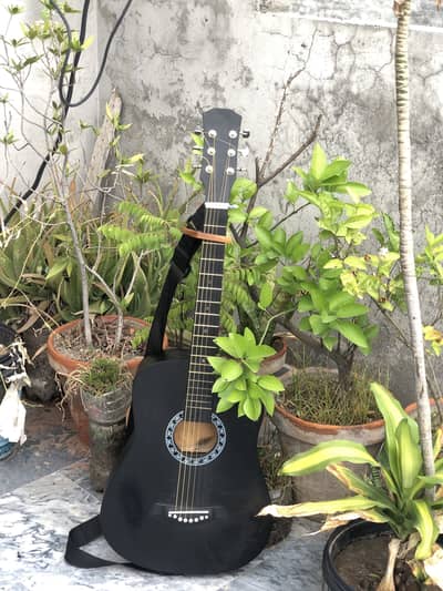 Black mat acoustic guitar ||