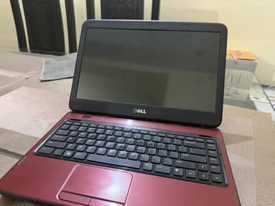 “Dell Red Laptop – Good Condition, Smooth Performance”