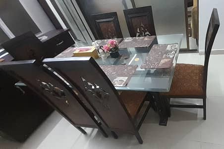 Wooden dining table with 6 chairs