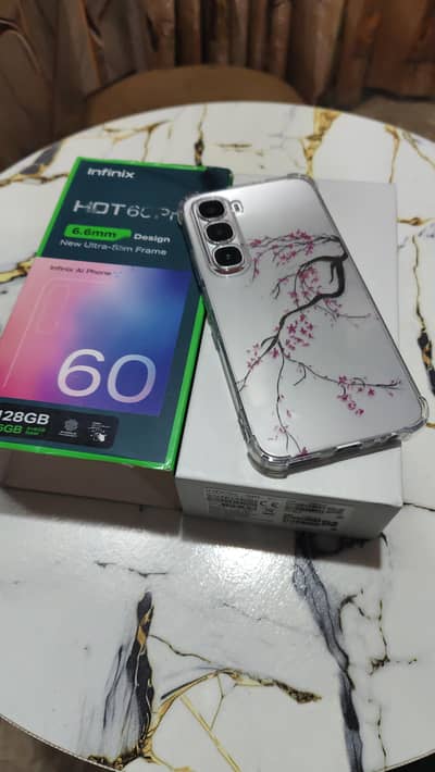 Infinix hot 60 pro 8gb128 full box silver color 7 months warranty