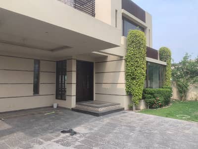 1 Kanal House For Rent In DHA Phase 1 4 Beds, 5 Bathrooms