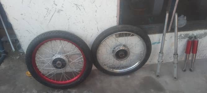 Honda 70 brand new rim with brand new tire and shoks