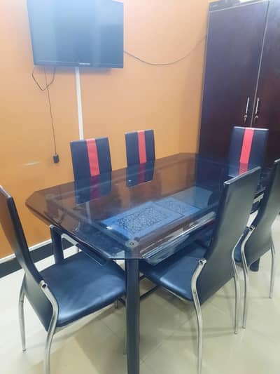 6 seater dining table with curved glass top