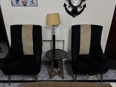Luxury sofa seats black and gold color