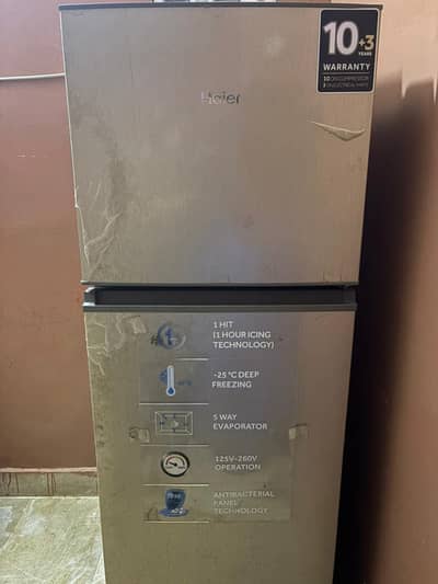 Haier Small new fridge slightly used with Box & Stabilizer with warnty