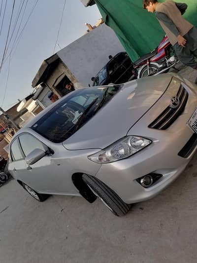 Toyota Corolla Gli model 2009 registerd punjab inner Geniun sel to sel
