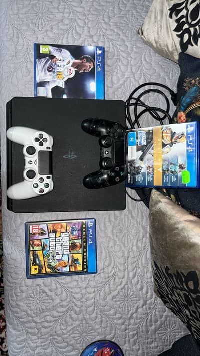PS4 slim 500 gb for sale with original remotes