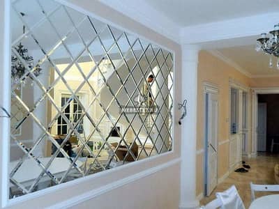 Diamond cut mirror wall