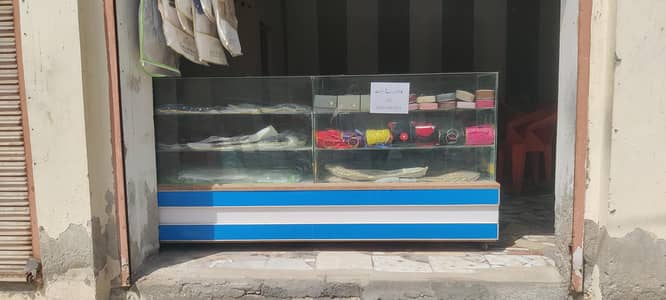 two glass counters for sale