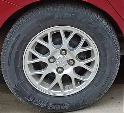 Original OEM Alloy Rims — Mitsubishi Lancer 2004
