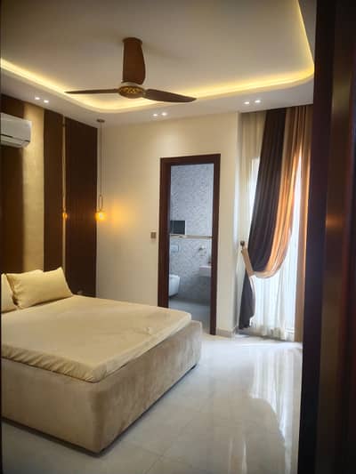 10 Marla Portion Furnish Room For Rent Near Wapda Town Tariq Garden Lahore.