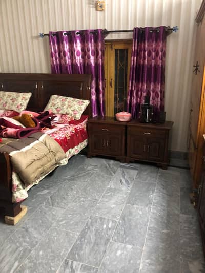 10 Marla Four-Story Semi-Commercial Building for Sale Ideal for Hostel or Investment