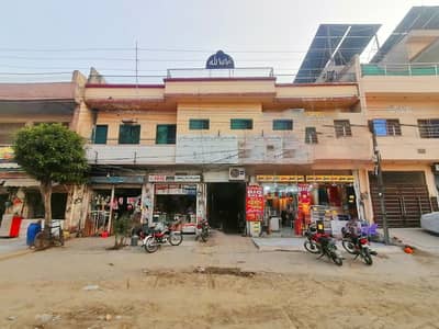 Building with 11 Commercial Shops Ideal For Rental Income