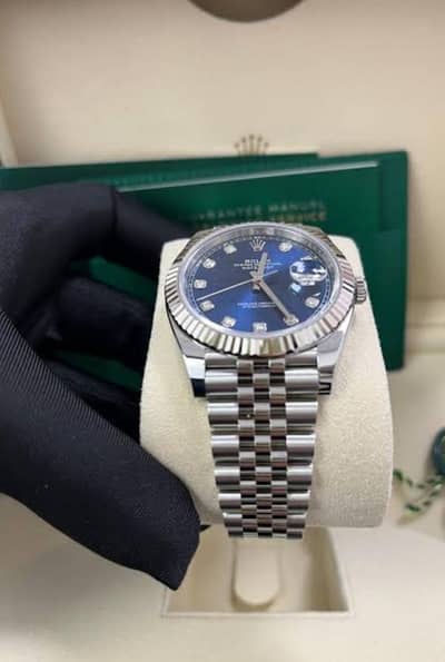 Rolex blue  dial . . . .