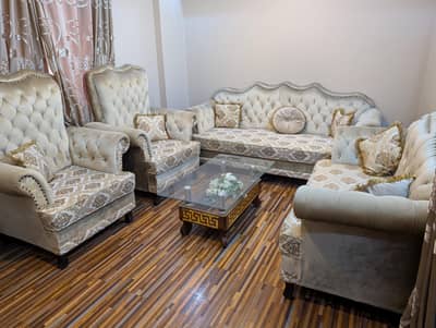 7 seater sofa with center table and 2 side seaters