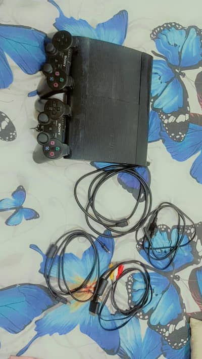 Ps3 super slim 465GB with 8 Games Jailbroken and 2 controller 