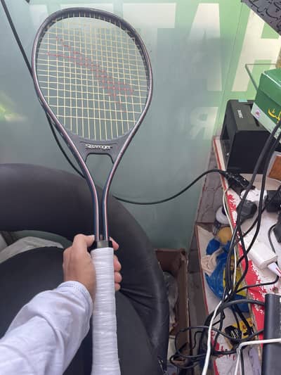 vintage Slazenger tennis racket, potentially model F200 Carbon.