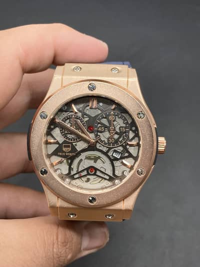 True Worth Skeleton Style Watch – Rose Gold Case, Blue Strap .