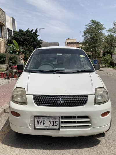 a home used total genuine fuel  efficient Mitsubishi menica like mira