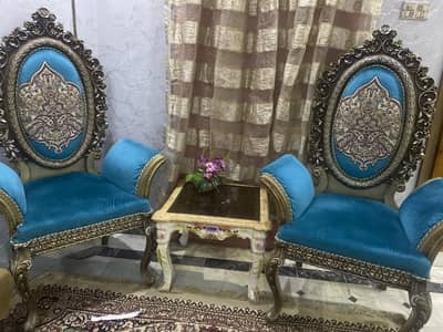 Two big sofa chairs and a 5 seater sofa set