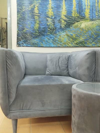 2 Sofa Chairs with a round table