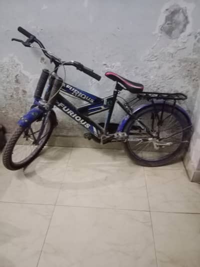 2 kids cycles Red color and blue colors