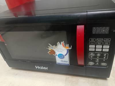 Haier 45L microwave oven grill and cooking HMN-45110EGB red ribbon