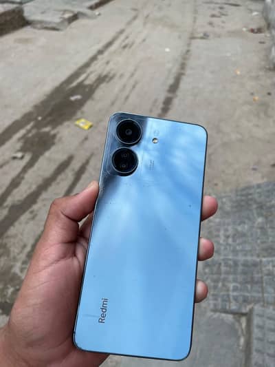 Redmi 13c in good condition with original box and charger