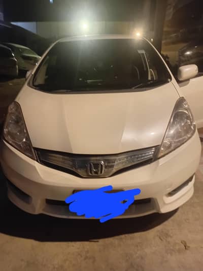 honda fit shuttle hybird 1 liter per 16 say 18 km running hai