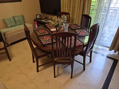 6 seat Wooden Dining Table with glass top for urgent sale