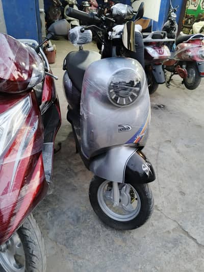 electric scooty avialable at our shop  contact 0300 4142432