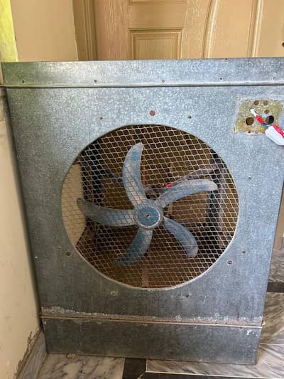 room cooler with solar plate attached